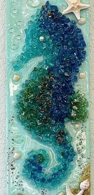 Crushed glass seahorse artwork made at Seaside Studio classes in Punta Gorda