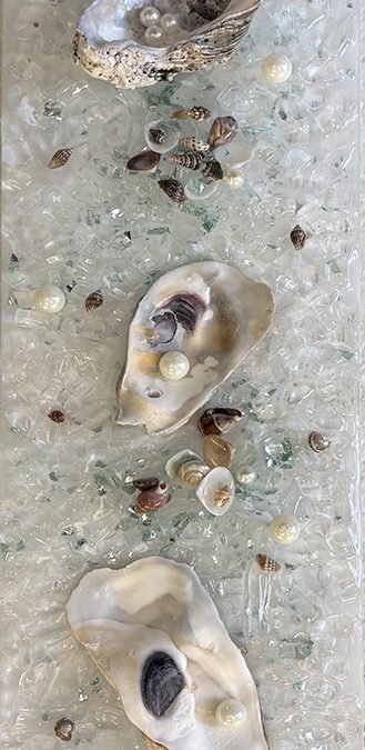 Artwork with Oyster shells made in the "Oyster Bay" art class at Seaside Expressions in Punta Gorda, FL